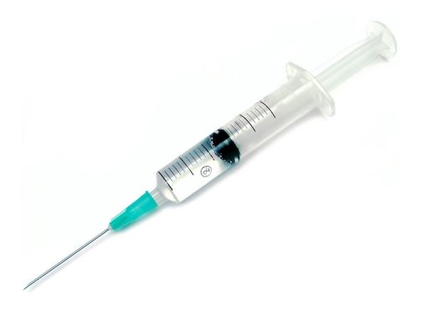 Syringe with fluid